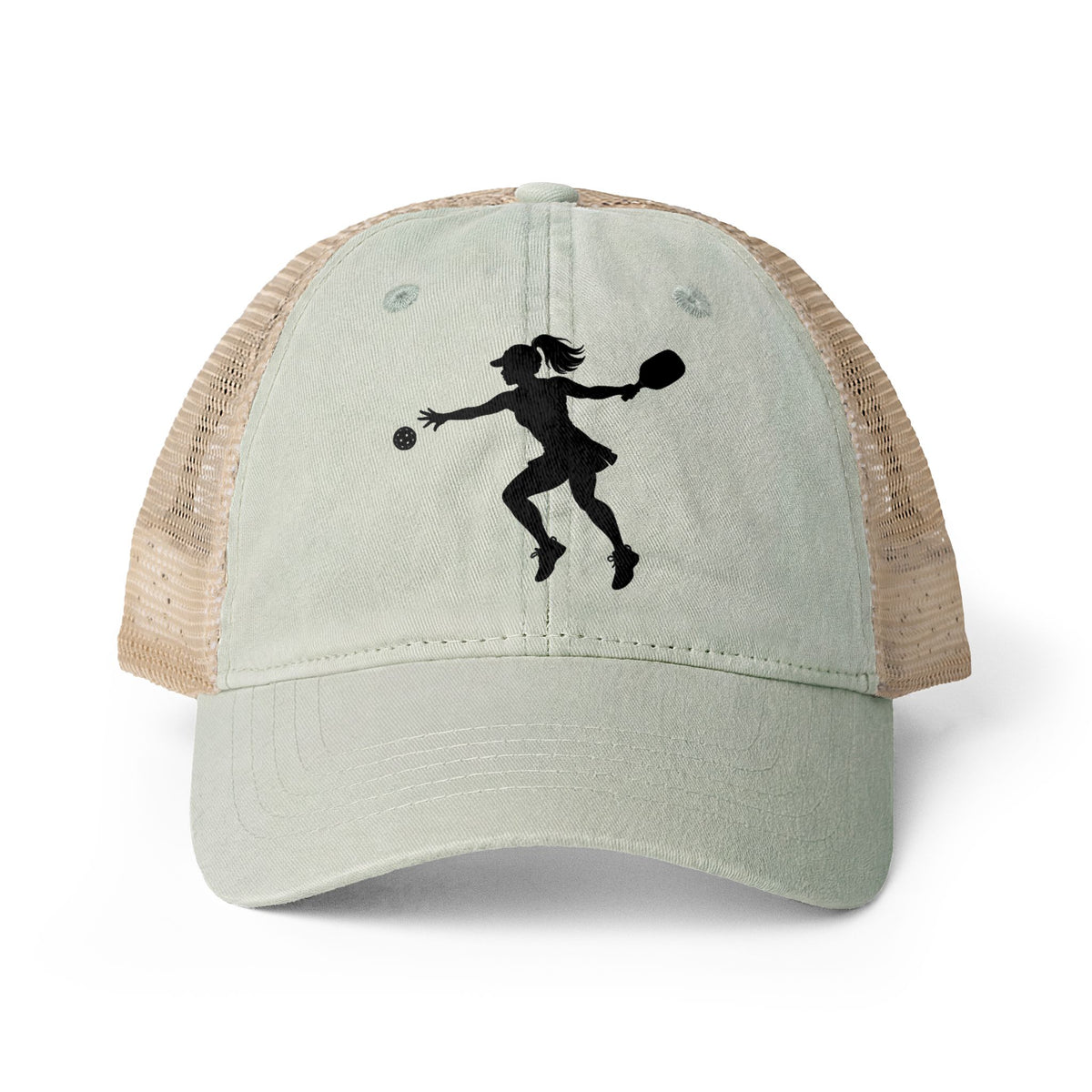 A light sage green and beige trucker hat with mesh side panels and a black silhouette of a pickleball player on the front, shown against a plain white background.